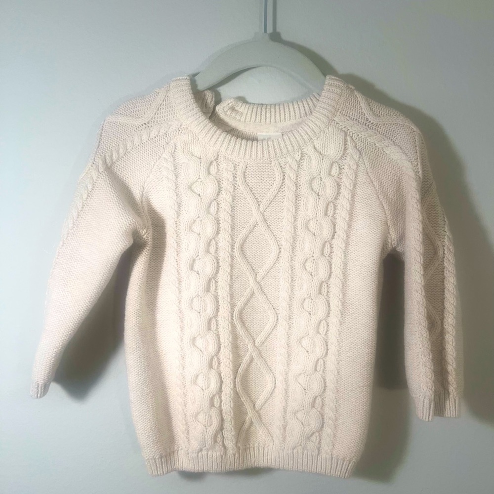 H&M Cream sweater. Size 12M. Cable knit front. 2 side buttons on neck.